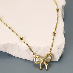 BOW PENDANT