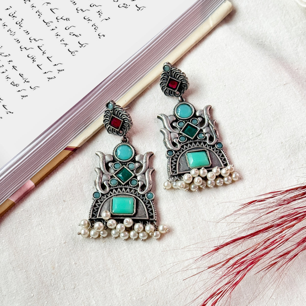 INDIAN BRASS STONE EARRINGS.